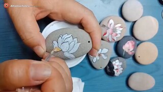 Lotus painted rocks