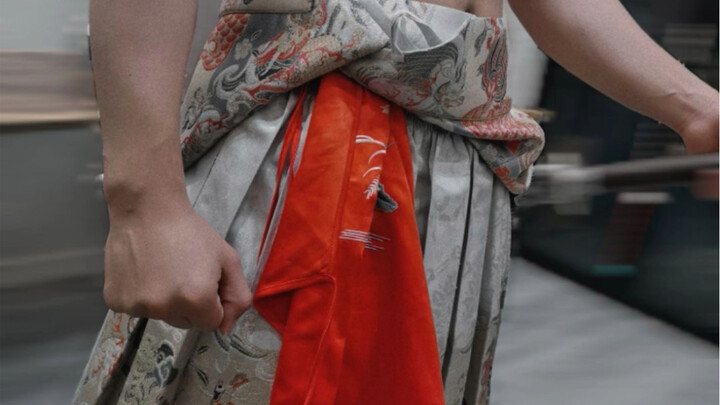 Is this the “that crimson mandarin-ducks belly band is still hanging from that ruffian’s belt” effec