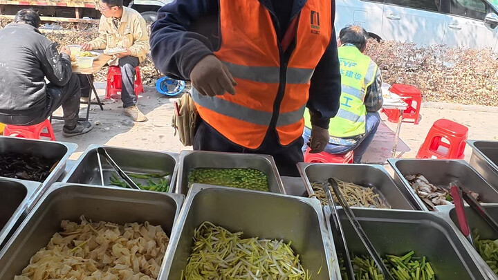 Street Food Cooking at a Construction Site