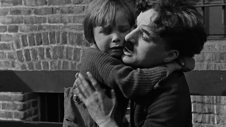 Chaplin's first feature film, a tramp accidentally picked up an abandoned baby, their story makes pe