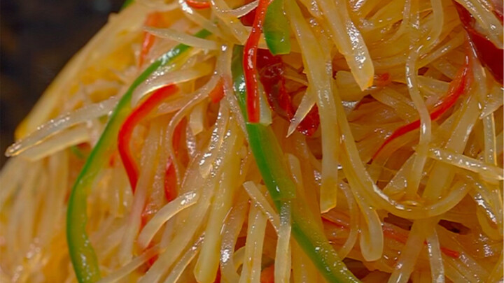 Don’t always just stir-fry shredded potatoes—try this quick and easy method for tangy, spicy, and cr