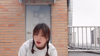 Why is there a gorilla dancing Perfect Night on a rooftop in Korea?