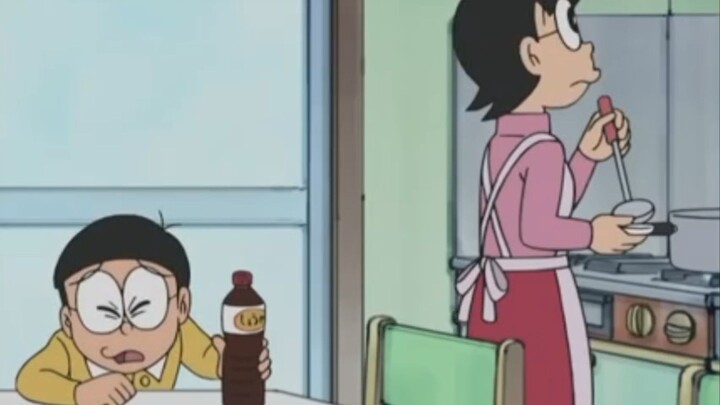 ibu nobita sedang memasak