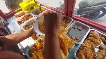 nasi kuning  jengkol ikan cakalang ayam goreng