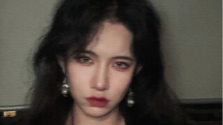 "Four Loves": Your long-haired wife has updated her makeup look.