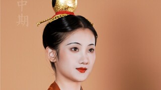 头戴山口冠，巧梳额云鬓。