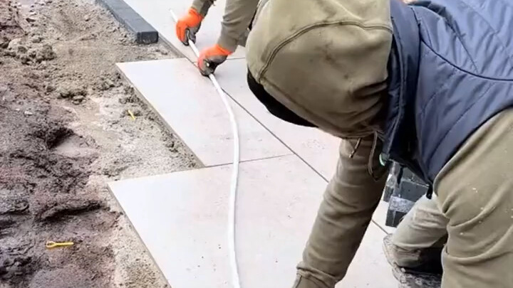 Courtyard curved tile installation in progress