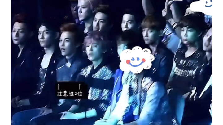 EXO melihat Huang Qishan bernyanyi dengan nada tinggi di atas panggung, reaksi setiap anggota sangat
