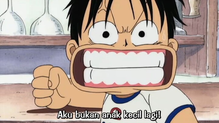 Gambarin Luffy kicik yg marah dan ingin memukul karena dikatain teman2 nya Shanks