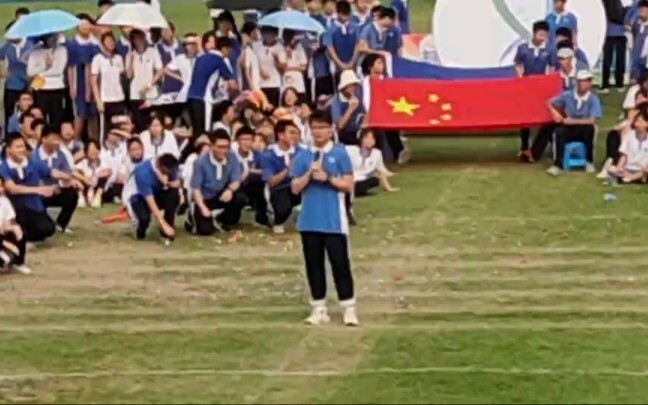 Singing Mumbius op at the opening ceremony of the sports meeting