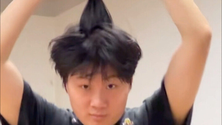 It’s like your bro’s just chilling on his phone while the pup is frolicking and playing with its pal