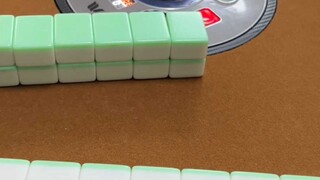 A novice plays mahjong for the second time during the Chinese New Year