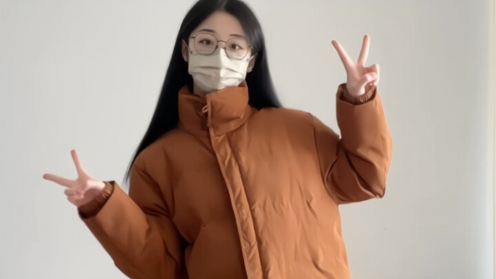 Orange puffer jackets really make you look fairer!