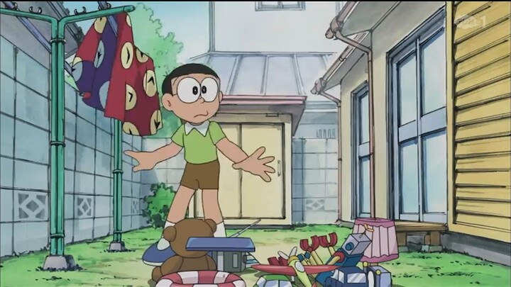 Doraemon Tập 005 , Khăn Trùm Thời Gian  , Nobita và bồ Công Anh .2