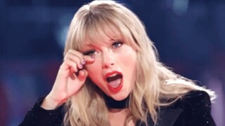 Taylor Swift menyimpan hadiah dari fans Tiongkok dalam bajunya!