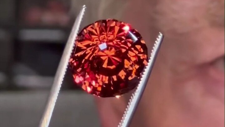 A master hand-cuts and polishes a gemstone... Witness its transformation from dull to dazzling, the 