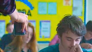 The teacher was broken down by the phone...