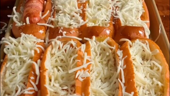 Cheesy Baked Hot Dog Delight