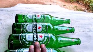 لحظة فك الضغط المذهلة لتدحرج الزجاجات على الدرج