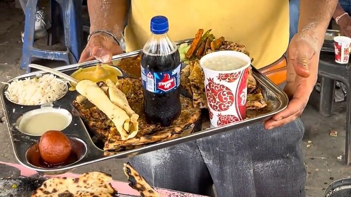 200-rupee Tali set meal, served with Thumbs Up soda due to the heat.
