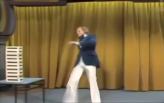 The man playing with Newton's coffin, 1975.