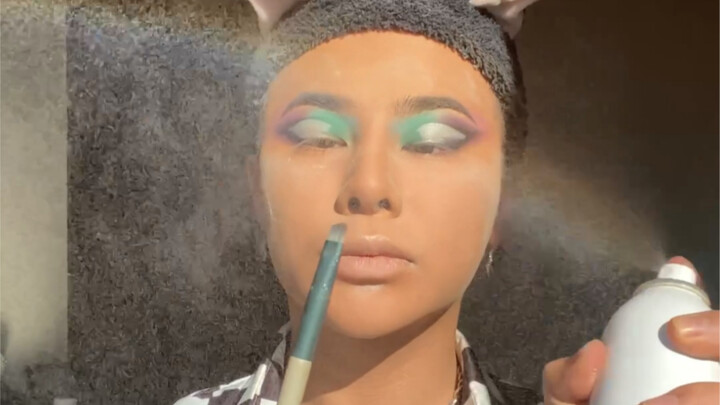 Makeup sprays out a rainbow — the wildest no-beauty-filter makeup on the whole platform; transform i
