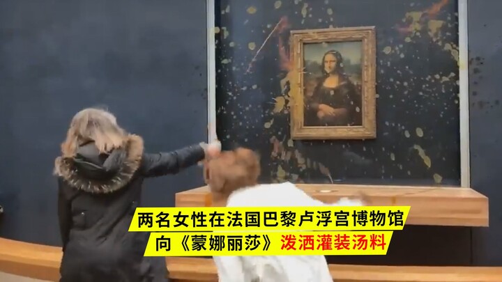 Di Museum Louvre Paris, dua perempuan menyiramkan sup kemasan ke arah “Mona Lisa” untuk mengekspresi