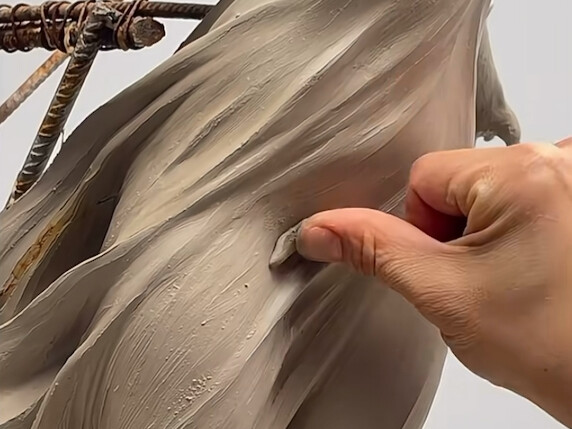How does a sculptor capture the shape of the wind?