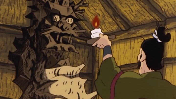 A boy tries to scare his younger brother away with a wooden dragon carving so he can keep the lacque