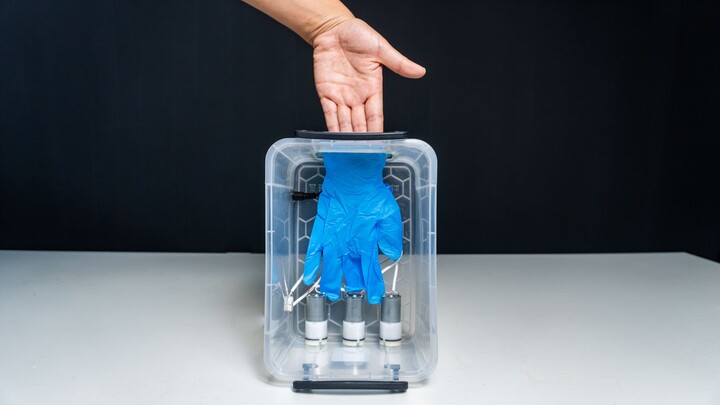 A prototype machine of wearing medical gloves conveniently