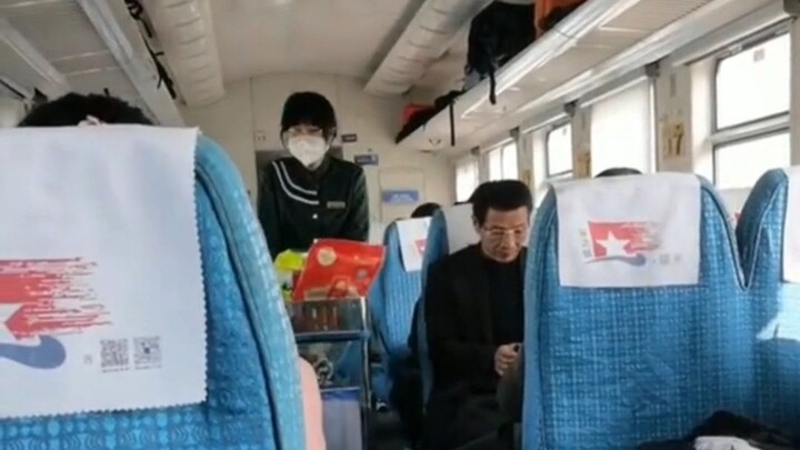 The flight attendant’s sweet, clipped voice sounds just like Lazy Yang again!