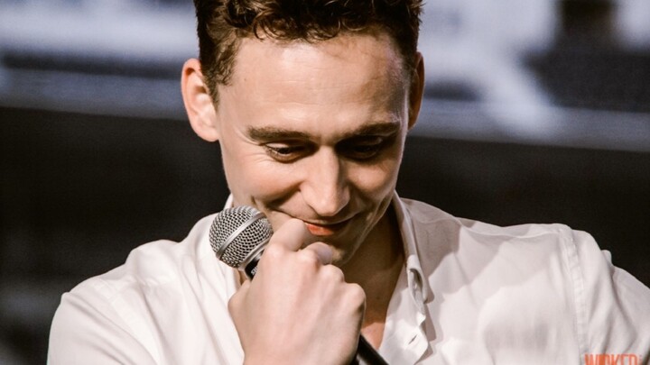 Tom Hiddleston: “Can I take off my jacket?” Male fan: “Take your shirt off too!”