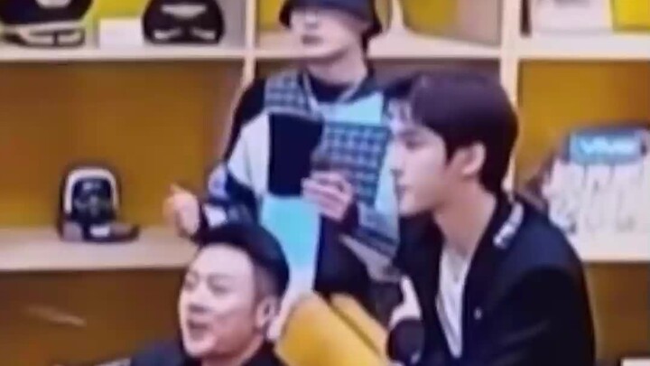 A cute kid eating ice cream in the corner??? This is too cute
