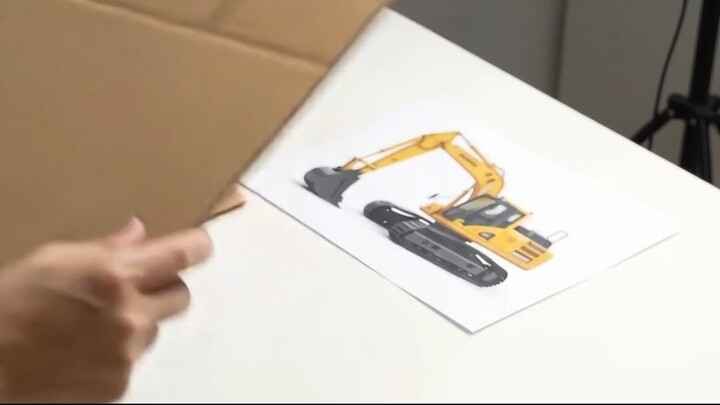 You turn cardboard into an excavator