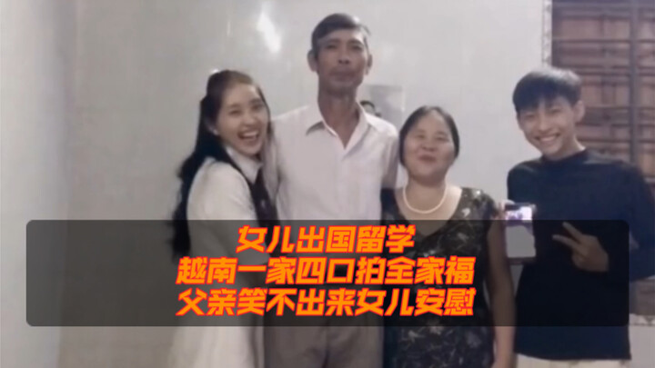 Một gia đình bốn người ở Việt Nam đang chụp ảnh gia đình trước khi cô con gái lên đường ra nước ngoà