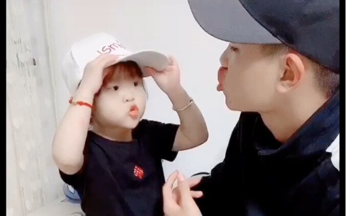 The little sister learns to be cool from her older brother and does it just like the pros!