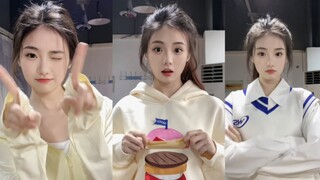 小姐姐笑得太甜了，连空气和穿的衣服也跟着变甜了好多！