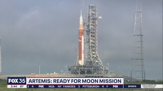 NASA's mega moon rocket rolls launchpad