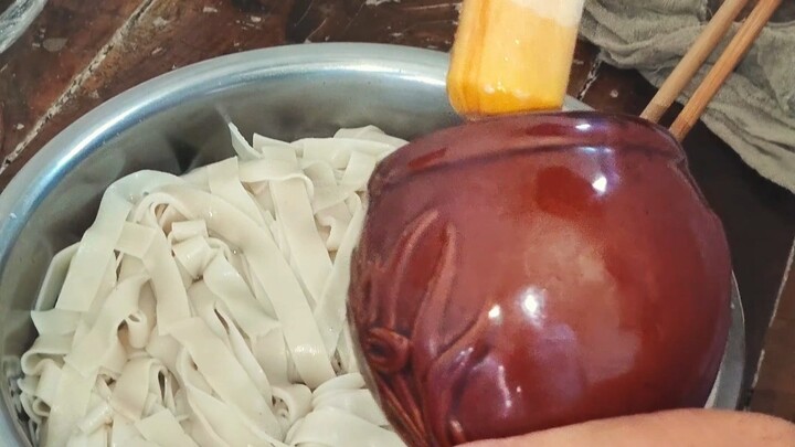 Eating noodles