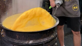 Seorang pemuda dari Xi'an menciptakan bor listriknya sendiri untuk menggoreng pangsit beras. Hargany
