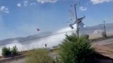 Pilot dies after plane collides with power lines, bursts into flames