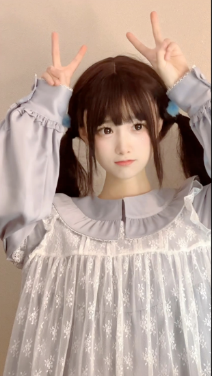 Life is tough—master's degree holder turns to busking for a living.