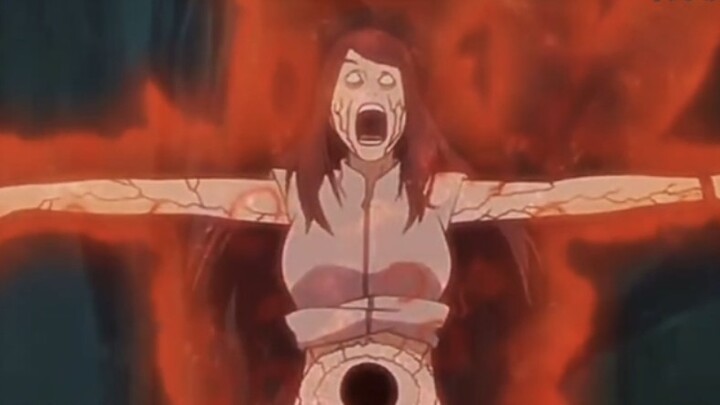 The masked man pulled out the Nine-Tails from Kushina's body and was ready to kill her