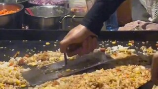 I was completely fascinated by the fried rice guy's technique.