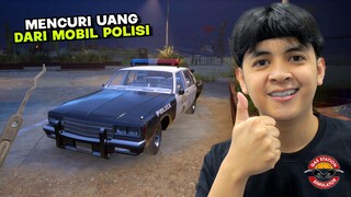 MENCURI UANG DARI MOBIL POLISI