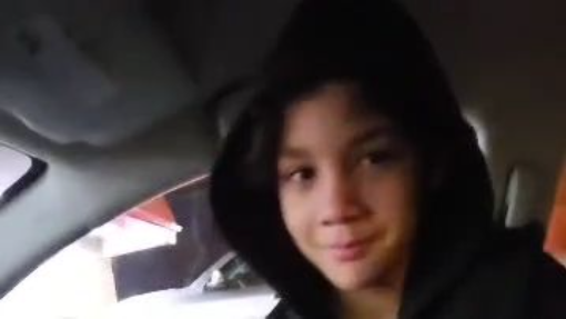 boy show his muscle