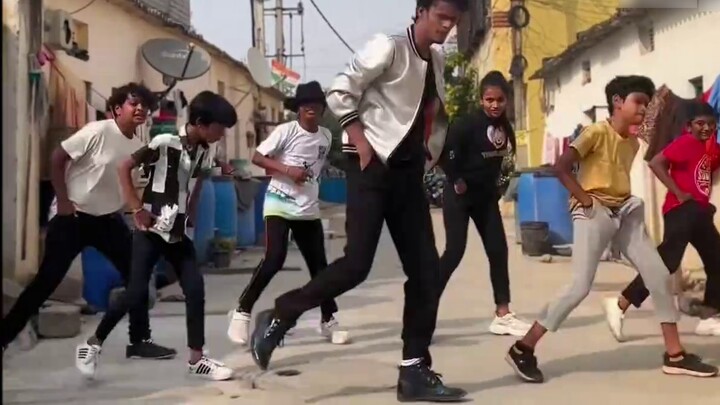 A village of dancers pay tribute to Michael Jackson