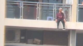 A 70-year-old grandmother tried to jump from the 13th floor, but a firefighter jumped in and saved h