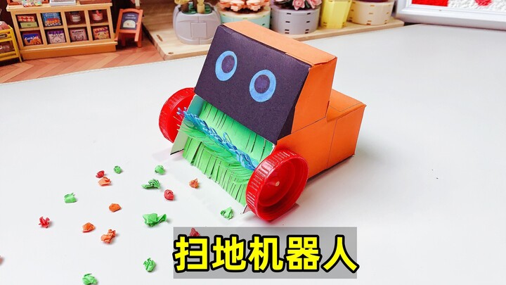 Làm robot quét nhà hình dáng ô tô, đặt trên bàn để dọn rác