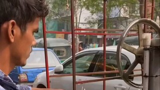 Sugarcane juice on the streets of India, the sugarcane is too long and hits my stomach